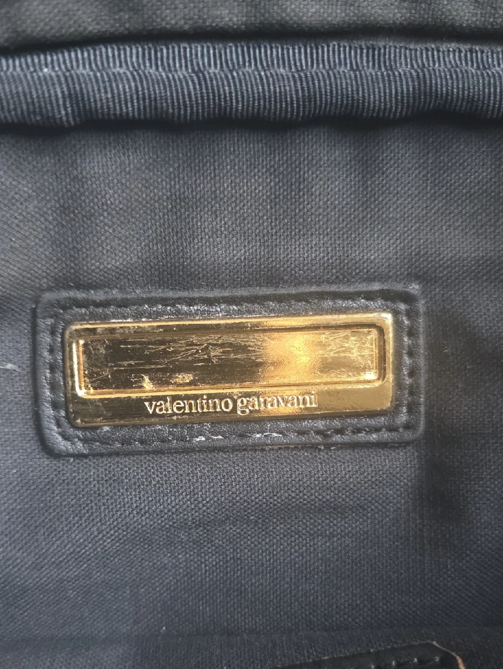 Valentino Garavani Black Leather Bag: Clutch, Dopp, or Organizer